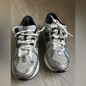 New Balance 1906R running shoe in the Silver Metallic/Black colorway Size 6.5